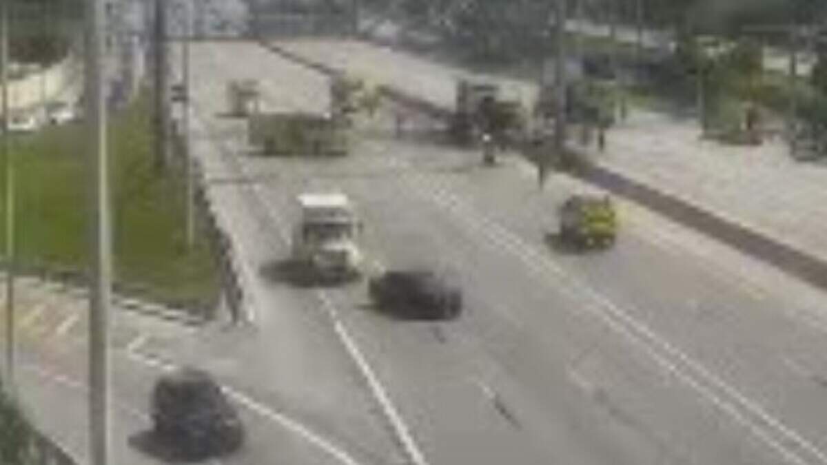 Emergency vehicles block the northbound lanes of Florida’s Turnpike near the Bird Road exit Thursday morning, July 16, 2026. The Florida Highway Patrol says a tanker truck overturned, killing the driver.